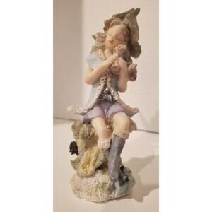 Fairy Holding Baby Cub Figurine